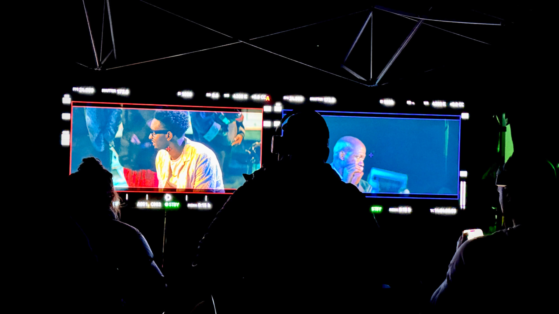 Directors watching monitors on the Boyz Trip set